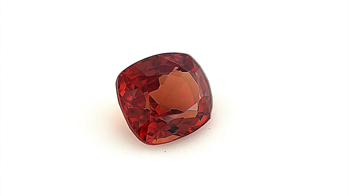 Orangey store red gemstone