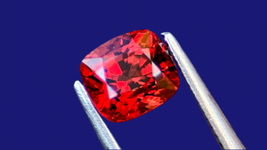 Intense red cushion-cut natural spinel gemstone from Mogok, Myanmar, showcasing exceptional brilliance and clarity, ideal for custom high-end jewellery.