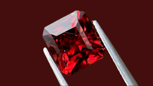 2.05-carat cushion-cut red spinel gemstone from Burma, measuring 7.1x6.4x5.0mm. Perfect for bespoke fine jewellery and luxury engagement rings.