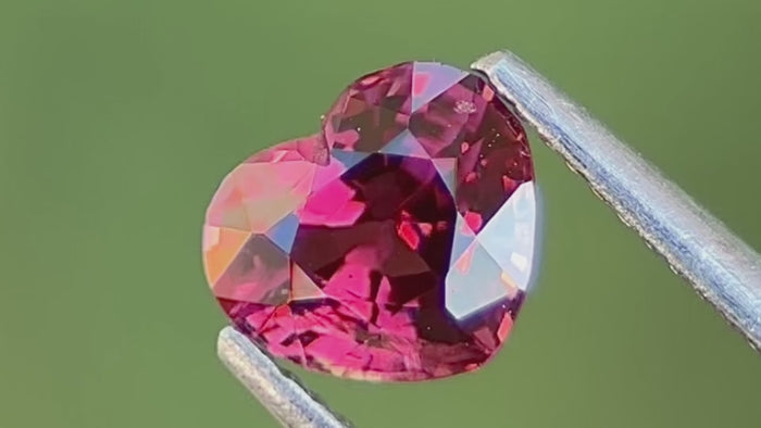 Natural untreated magenta-pink heart-shaped spinel gemstone from Myanmar, featuring brilliant clarity and rare colour, perfect for luxury fine jewellery designs