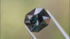 Stunning 3.75ct dark green spinel, featuring an octagonal cut with a few visible inclusions, hand-cut natural gemstone, perfect for high-end custom jewellery designs.