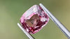 Video of a baby pink spinel gemstone, 1.74 carats, with dimensions 7x5.9x4.3mm, ethically sourced from small-scale miners, captured in natural daylight to highlight its delicate colour and brilliance. Perfect for an engagement ring centre stone.