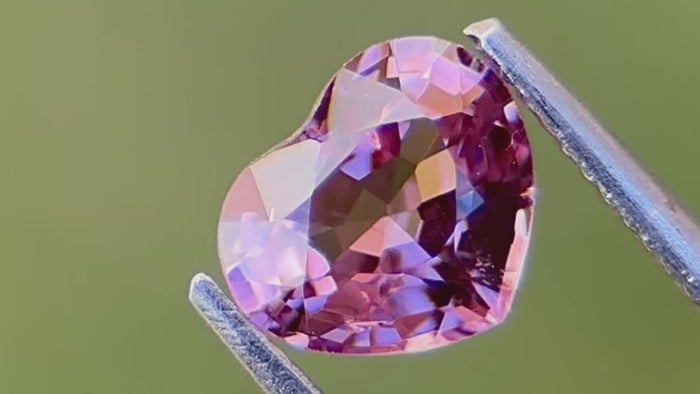 Affordable luxury pink Burmese spinel, heart-shaped and ethically sourced, with a hardness of 8. Ideal as an August birthstone for bespoke engagement rings or custom jewellery.