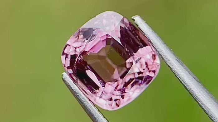 Pale purplish-pink natural untreated spinel gemstone, captured in natural daylight. Ideal for custom fine jewellery and engagement rings.