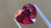 Heart-shaped orangey-red natural spinel gemstone, hand-cut to perfection, ideal for bespoke fine jewellery pieces.