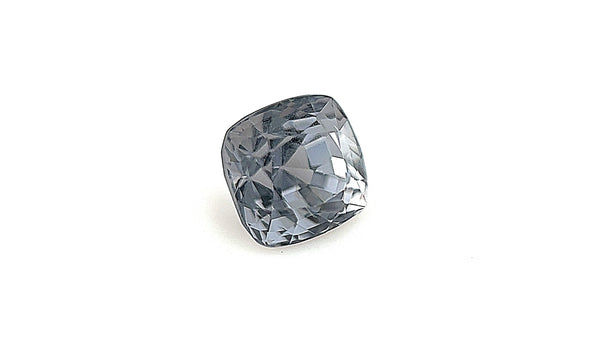 One-of-a-kind greenish-grey cushion-cut natural spinel gemstone from Myanmar, photographed indoors with a gemlight box to emphasise its unique colour and clarity. Suitable for bespoke fine jewellery and engagement rings.